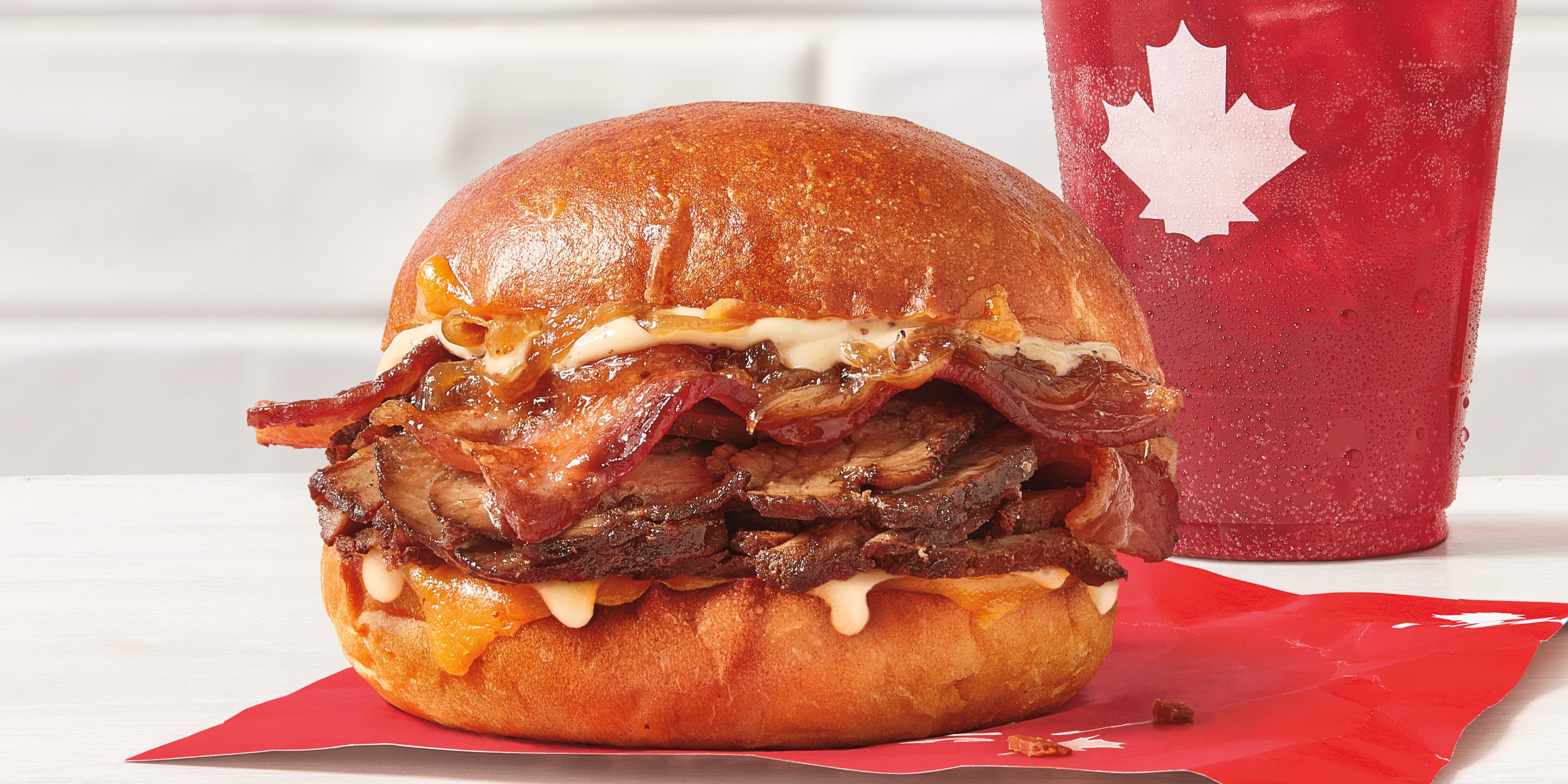 Tim Hortons introduces the new Supreme Stack sandwich, served hot out of the oven and stacked high with seasoned steak and double smoked bacon